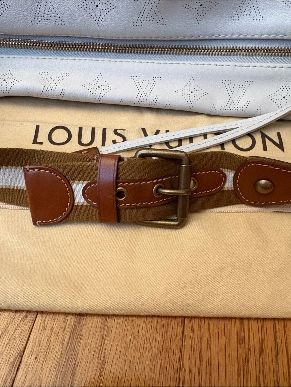 Louis Vuitton White Onatah GM Hobo Bag With Brown Buckle Strap and Accents